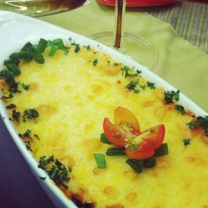 Escondidinho de bacalhau com purê de banana da terra